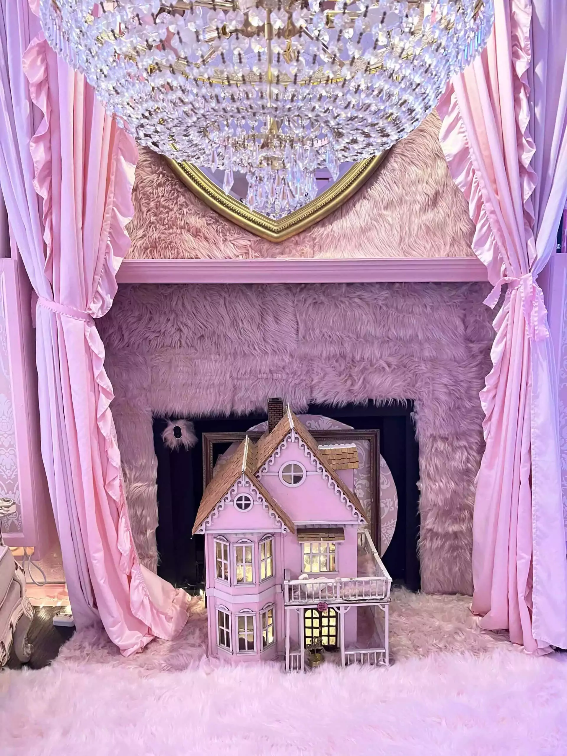 The Dallas Dollhaus Photography Studio pink dollhouse and furry fireplace
