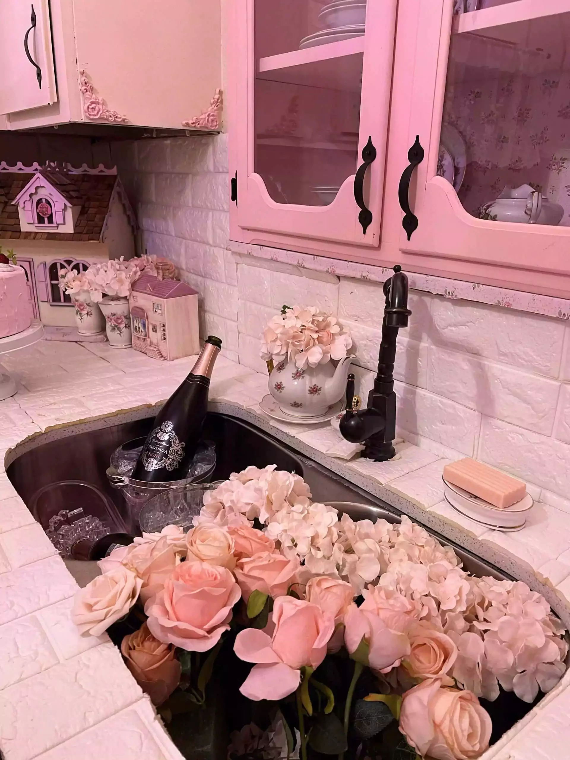 The Dallas Dollhaus Photography Studio pink flowers in kitchen sink