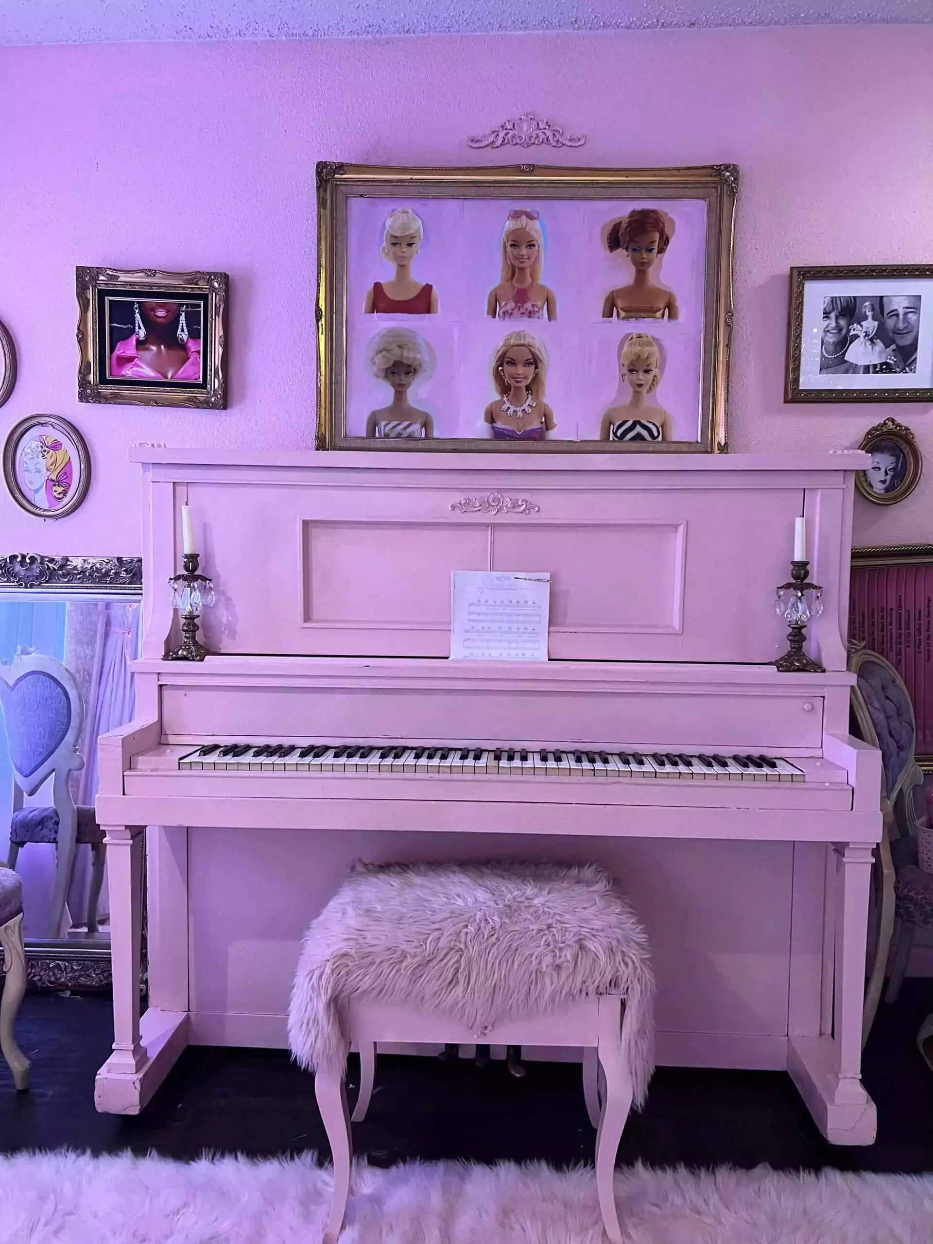 pink piano and baries framed on wall