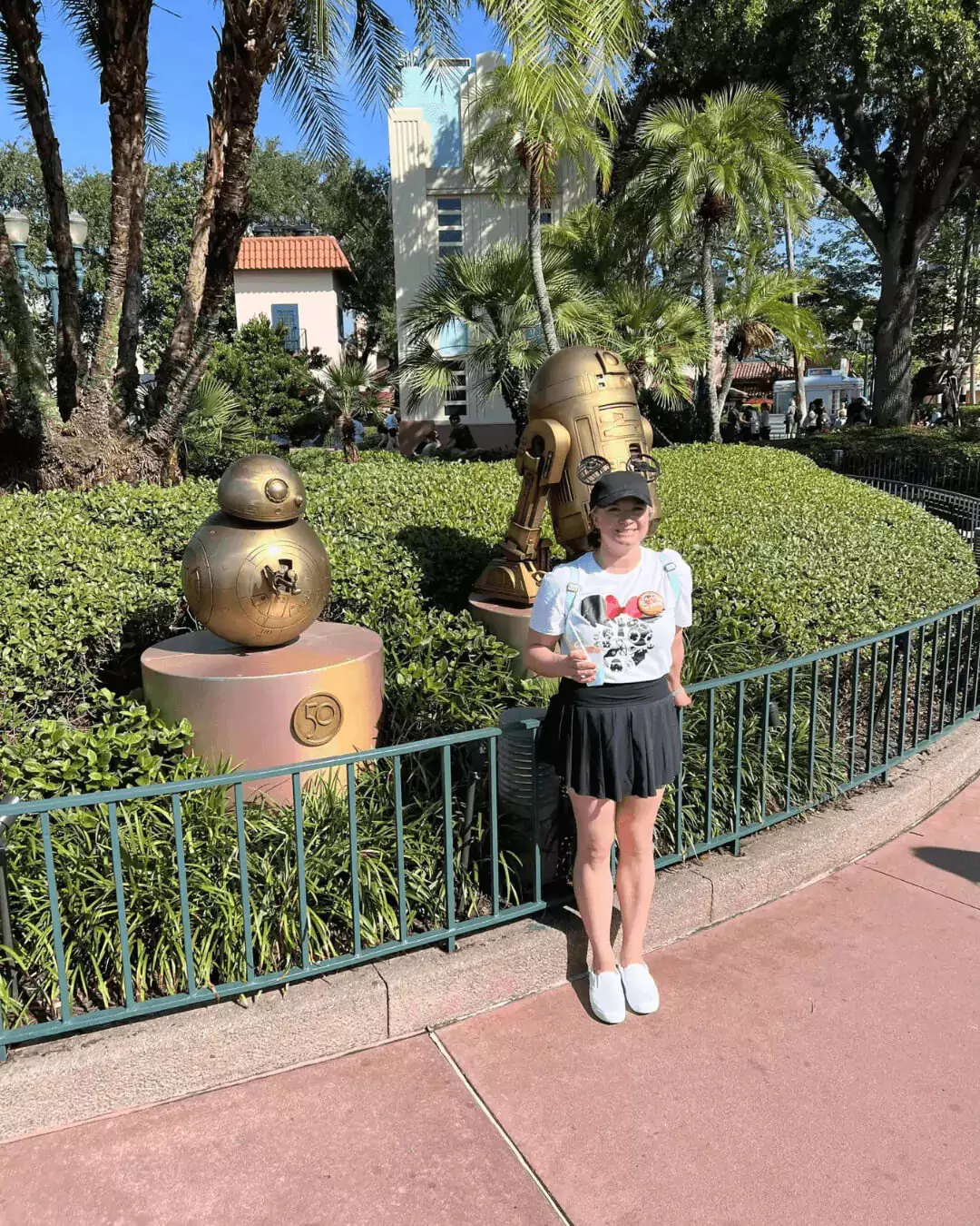 katie in front of star wars r2d2 statue at disney hollywood studios