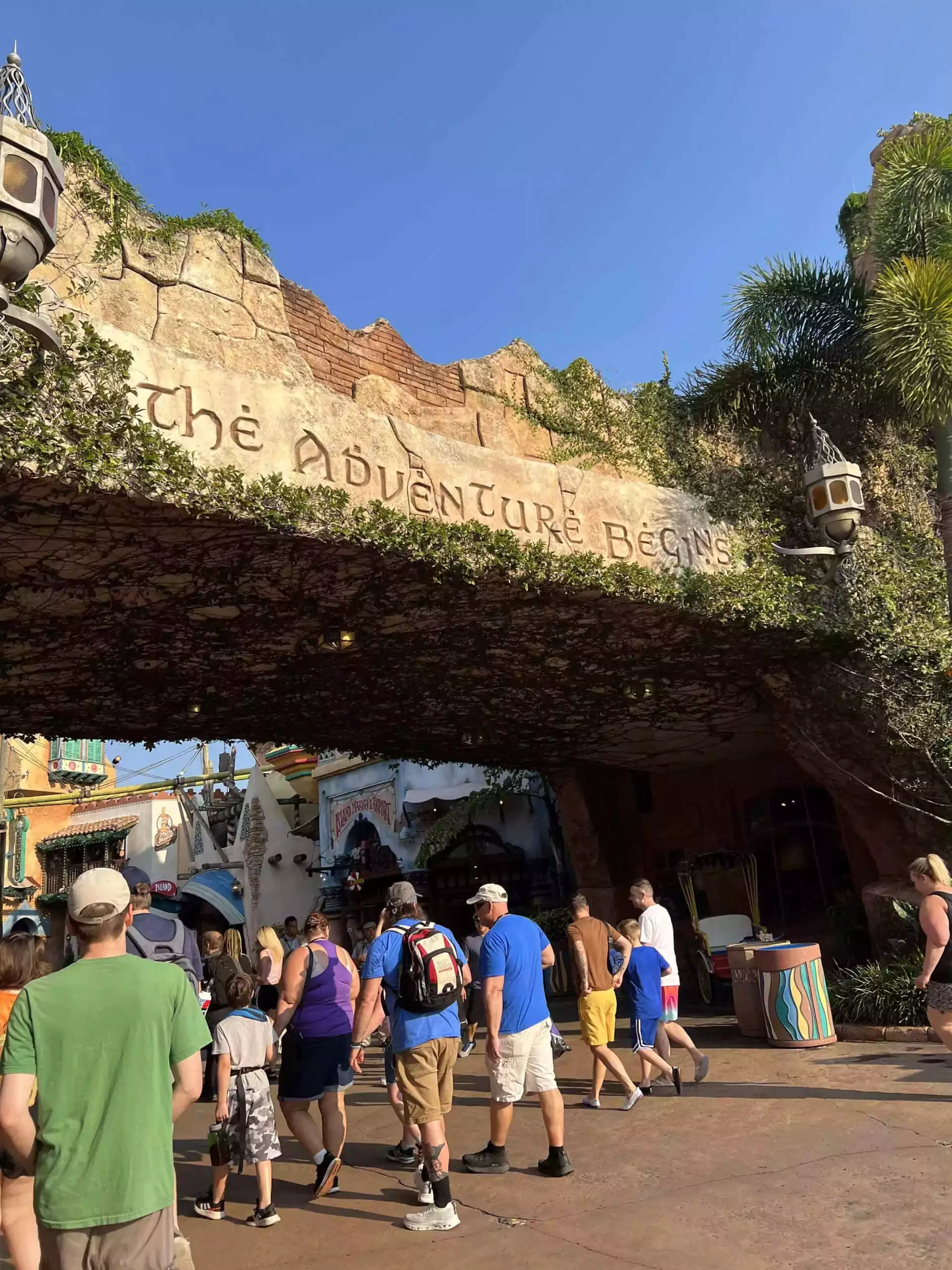 the adventure begins entrance sign to Universal Studio theme park in Florida
